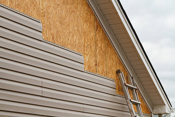 Professional Siding Installation technician working in Crabtree, PA